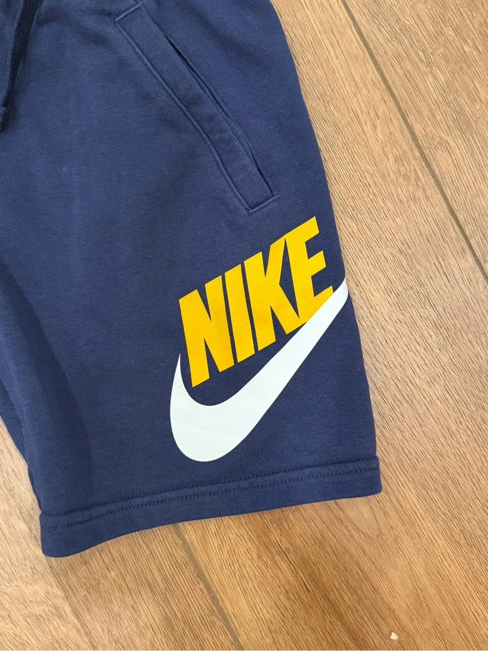 Nike Boys Navy Shorts with Yellow and White Logo